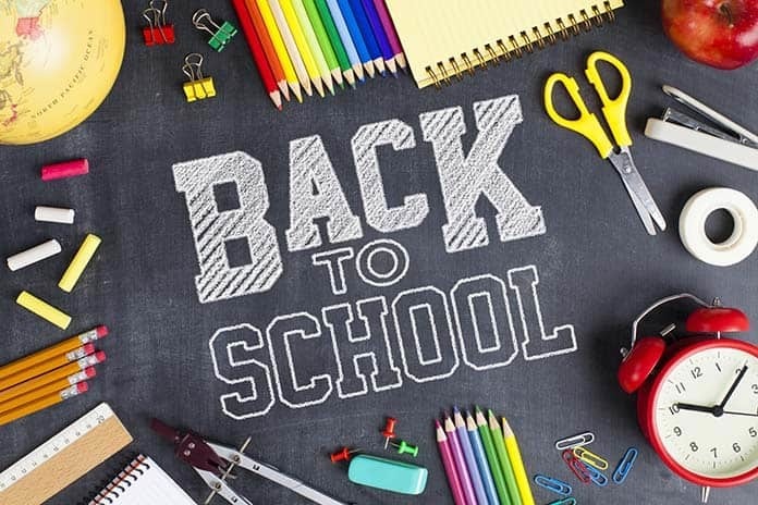 various school supplies and text "back to school"
